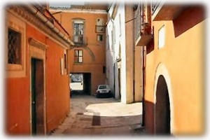 A walk in the Borgo towards the Piazza.