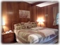 Spacious Master Bedroom with King-Size Bed, Desk, & Ceiling Fan!