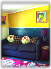 Our "hippy" throwback with a flair...bedroom with sofa/double bed!