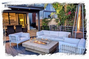Relax with family and friends by the fire table on our expansive back deck